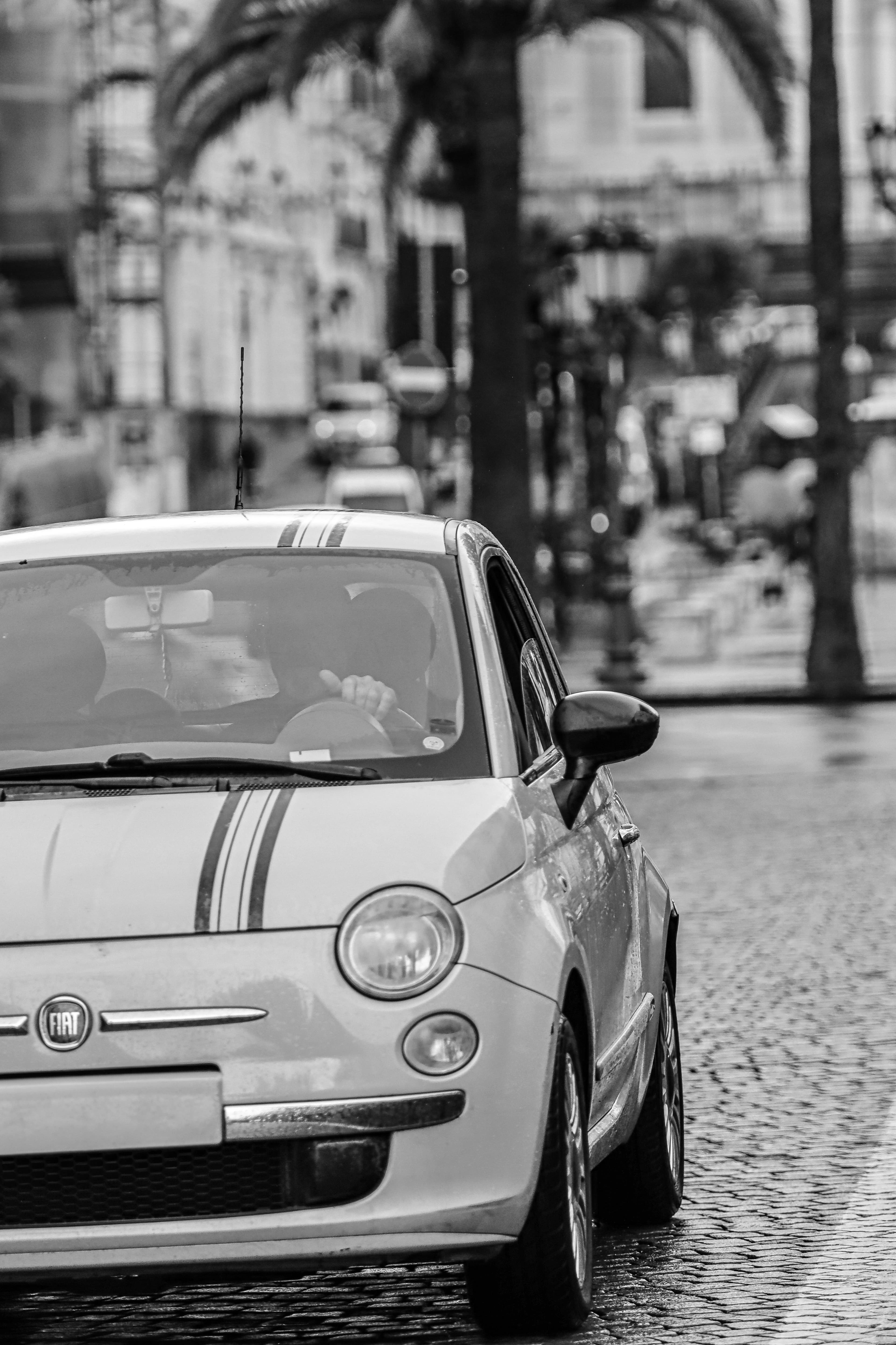 Fiat Car on Cobblestone Street